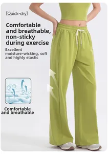 Detalle de pantalones de yoga de cintura alta con cordón blanco y cintura elástica