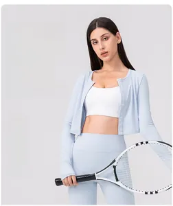 Detail of light blue sports cardigan showing high elasticity and skin-friendly fabric texture