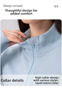 Detail of light blue yoga jacket showing a stand collar design and soft knit fabric texture