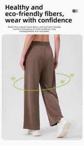 Detail of eco-friendly brown wide leg pants showing soft drape and sustainable fabric