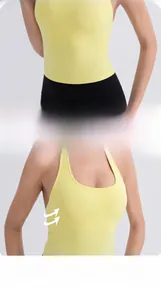 Detail of high-elasticity yellow yoga vest showing the slimming fit and side support