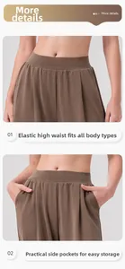 Detail view of elastic high waist and practical side pockets on brown wide-leg pants