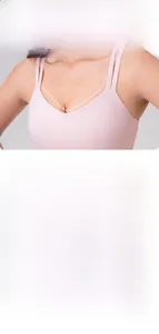 Close-up of pink yoga bra with double thin shoulder straps and V-neck design