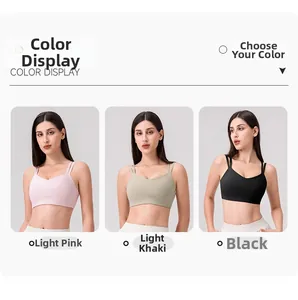 Three-color display of cross-back sports bras in soft pink, light khaki, and black colors