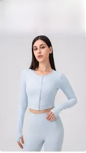 Close-up of light blue yoga top featuring thumb holes and breathable ribbed texture