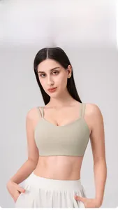 Sage green yoga bra with thin double shoulder straps and a v-neckline for sports