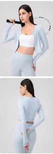 Close-up of flexible yoga cardigan featuring thumb holes and high-elasticity fabric
