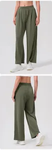 Detailed front and back views of olive green wide-leg sports trousers with high-elastic waist