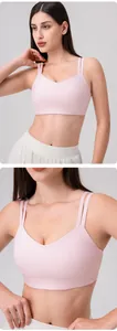 Detail of light pink sports bra with double shoulder straps and high-elastic fabric