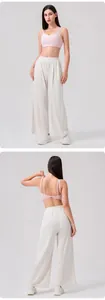 Lycra sports bra and wide-leg yoga pants set showing back cross straps detail