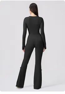 Detail of female sports top sleeve with thumbhole and yoga pants side button slit