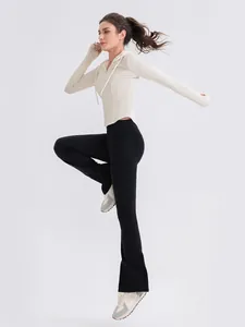 Slim fit hooded yoga top with flared leggings in off-white and black workout set