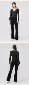 Dettagli del completo yoga nero da donna con giacca slim-fit e leggings a zampa