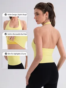 Halter neck yoga vest in light yellow with open back design and removable chest pads