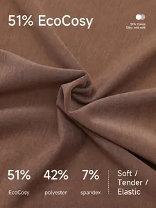 Brown wide leg sports pants in breathable fabric with 51% EcoCosy and soft diagonal texture