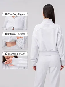 Women's loose grey yoga set with two-way zipper, internal pockets and thumbholes