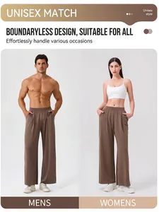 Unisex wide-leg brown lounge pants in a draped loose fit shown on men and women