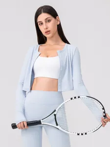 Women's light blue Lycra yoga set featuring a button cardigan and high-waist sports leggings