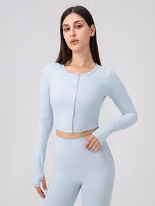 Women's light blue Lycra yoga set featuring long sleeve button cardigan and high waist leggings