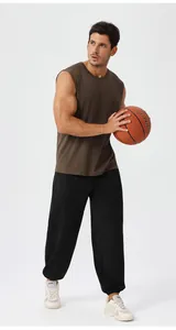 Men's loose breathable joggers with drawstring waist and brown tank top for fitness training