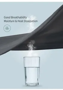 Macro demonstration of moisture-wicking yoga pants showing high breathability with steam