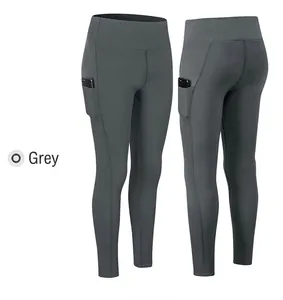 Detail view of high waist grey yoga pants with practical side pockets for phone storage