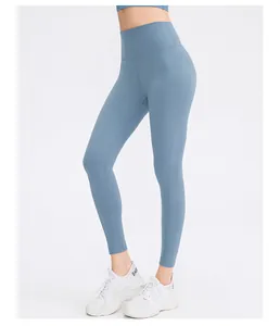 Detailed view of high-waisted yoga leggings in dusty blue with a matte brushed texture