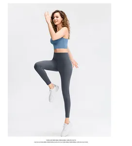 Dynamic view of high-waist yoga leggings and sports bra in motion for fitness
