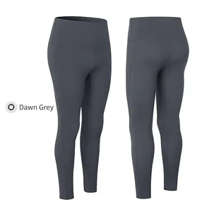 Detail of high-waisted Dawn Grey yoga leggings featuring tummy control and lifting effect