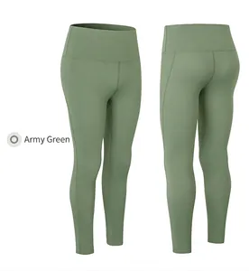 Detail of high-waist army green yoga pants with sculpting seams and elastic fabric