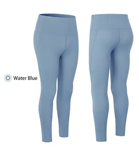 Detail of high-waist water blue yoga leggings featuring seamless ergonomic stitching