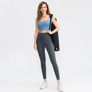 Women's fog blue sports bra and charcoal grey high-waist yoga pants fitness set