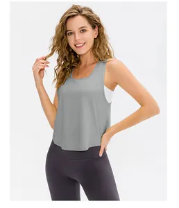 Front view of a loose grey yoga tank top featuring large armholes and quick-dry fabric