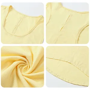 Pale yellow yoga tank top with mesh fabric detail and breathable back cutout design