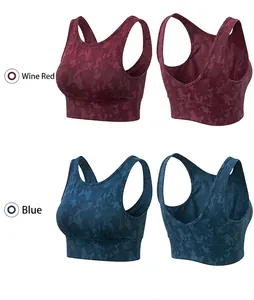 Detail view of jacquard camo sports bras showing racerback design in wine red and blue