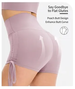 Detail view of high waist yoga shorts with side drawstrings and peach butt lifting seam