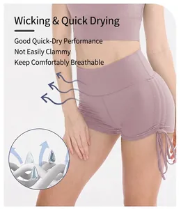 Detail of high-waist yoga shorts featuring side drawstring and breathable fabric texture
