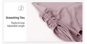 Detail of adjustable side drawstring and ruched fabric on purple yoga shorts