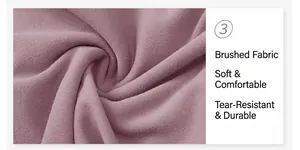 Close-up macro view showing the soft brushed fabric texture of pink yoga shorts