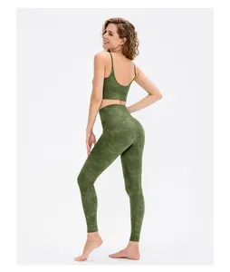 Close-up of high-waisted yoga leggings with marble print and moisture-wicking fabric