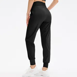 Pantalon de sport noir taille haute pour femme pour le yoga et le fitness avec poignets