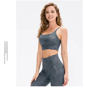 Close-up of dark grey marble print yoga set featuring high-elastic sports bra and leggings