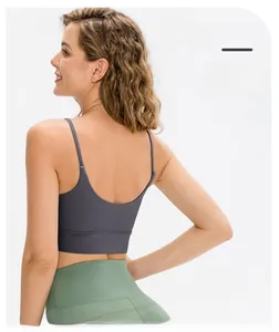 U-shaped backless sports bra with thin straps and breathable gray fabric detail