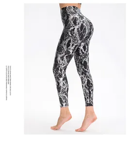 Detail showing the snake print pattern and lifting fit of high-waist yoga leggings