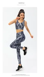 Close-up of high-elastic snake print yoga sports bra and leggings set with python pattern