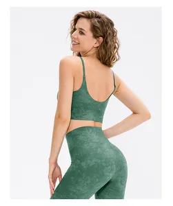 Close-up of high-elasticity dark green marble print fabric for sports bra and leggings