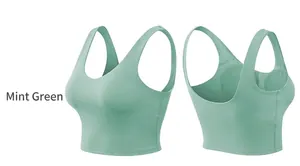 Close-up of mint green yoga bra showing U-neckline and seamless wide shoulder straps