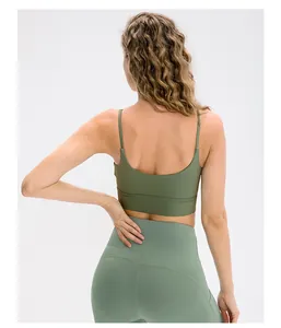 Close-up back view showing the fine shoulder straps and supportive seams of the yoga set