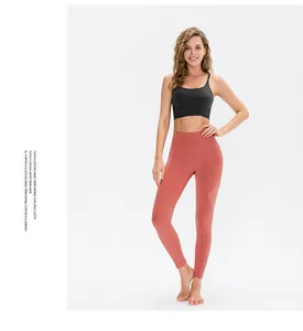 Detail of high-waist yoga leggings with side seam stitching for contouring and lifting