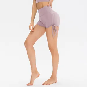 Women high waisted yoga shorts with side drawstring and ruched detail in lavender